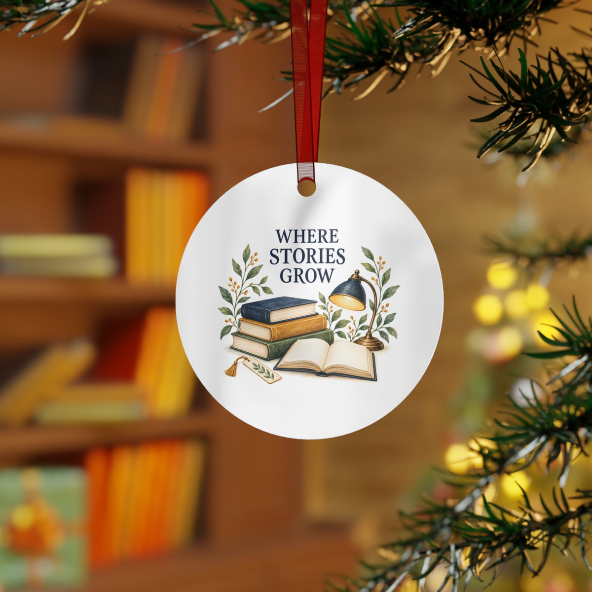 Lifestyle view of the round ornament with reading teacher artwork and red hanging ribbon.