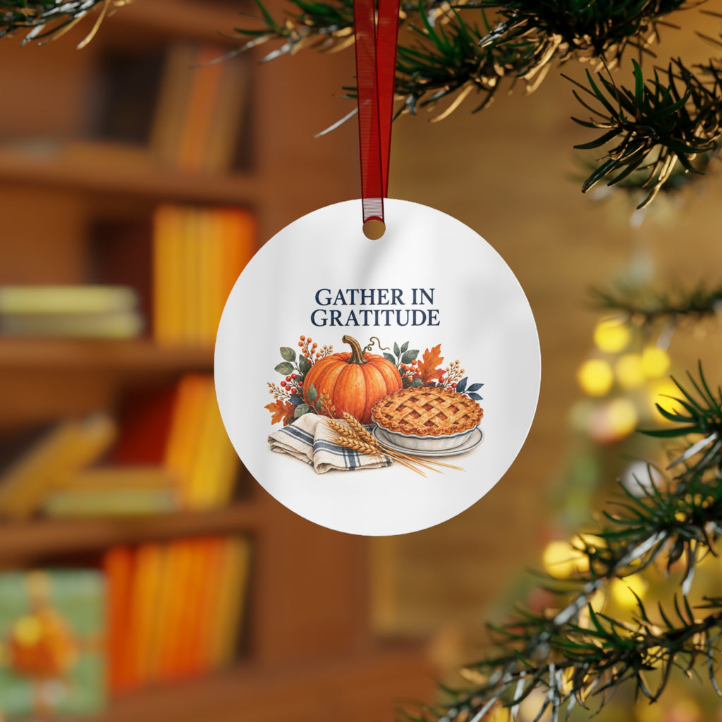 Lifestyle view of the round ornament with Thanksgiving artwork and red hanging ribbon.