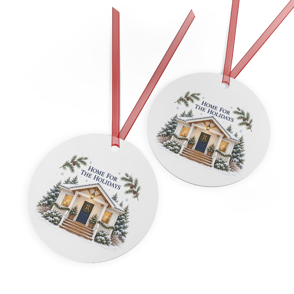 Front and back views of the double-sided round ornament with winter house artwork.